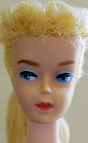 Number 7 Lemon-Blonde Ponytail Barbie  showing a head shot